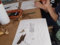Participante creando su obra