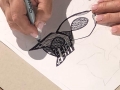 Participante creando su obra