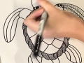 Participante creando su obra