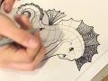 Participante creando su obra