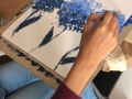 Participante realizando su obra