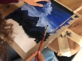 Participante realizando su obra