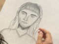 Participante creando su obra