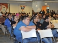 Visitantes del evento escuchando una charla