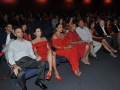 Visitantes sentados en el teatro