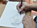 Participante realizando su obra