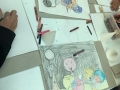 Participantes creando sus obras